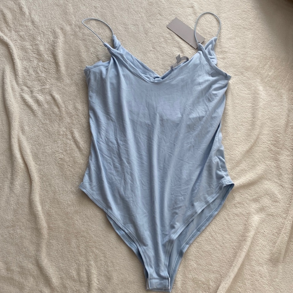 Baby Blue body suit - never worn